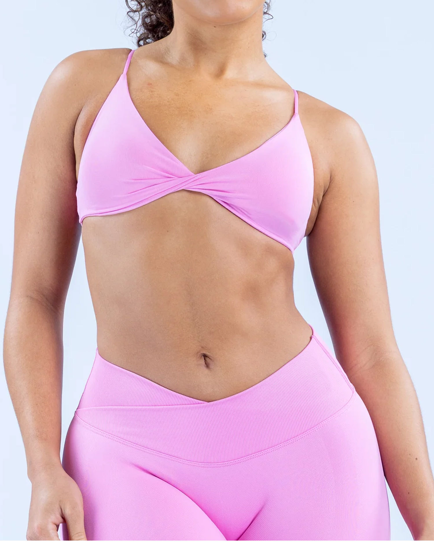 Matching pink sports bra and activewear bottom
