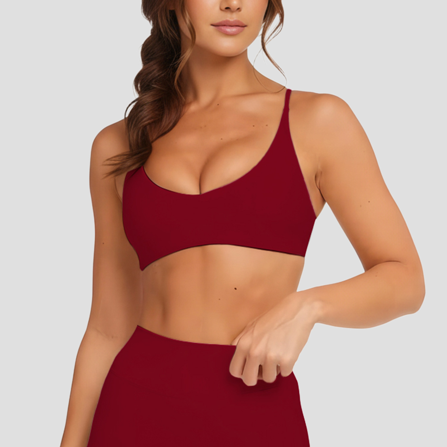 Burgundy sports bra and matching activewear bottom from ORIA's product range